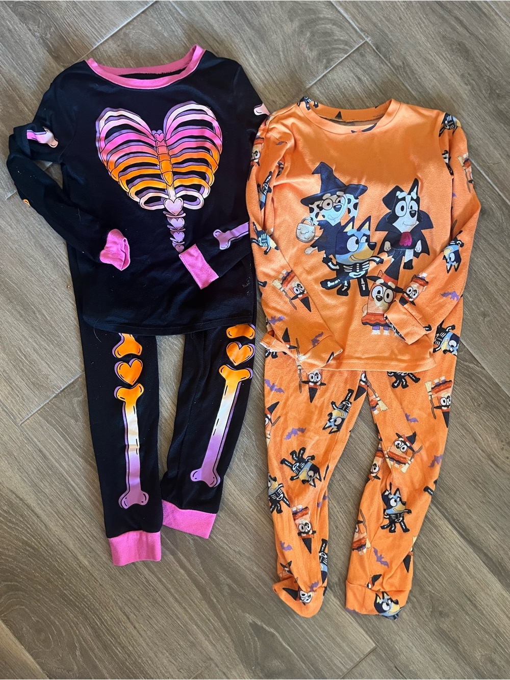 Kids Black & Orange Halloween Pajama Set and a Bluey Halloween set